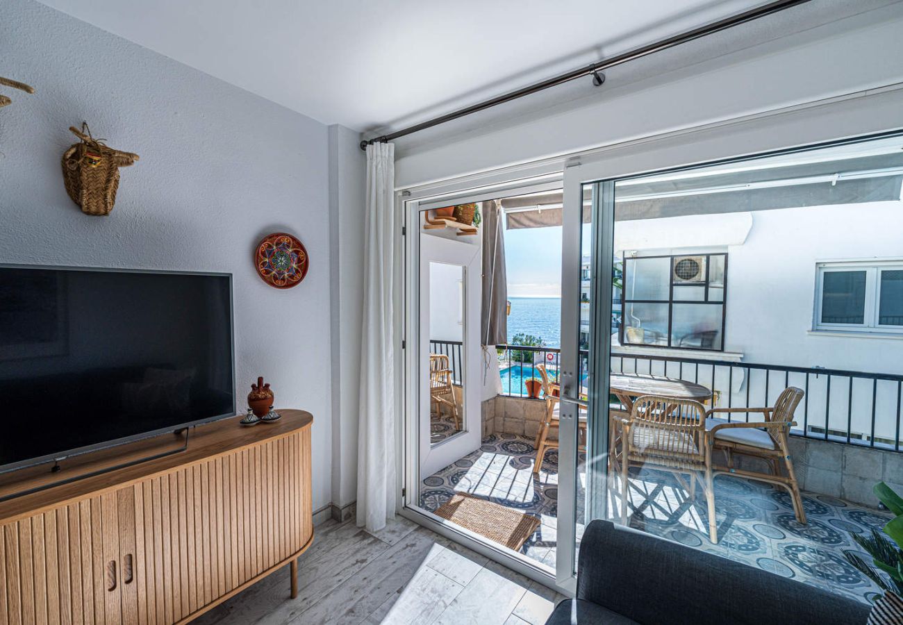 Zithoek met bank en televisie in Acapulco Playa 302