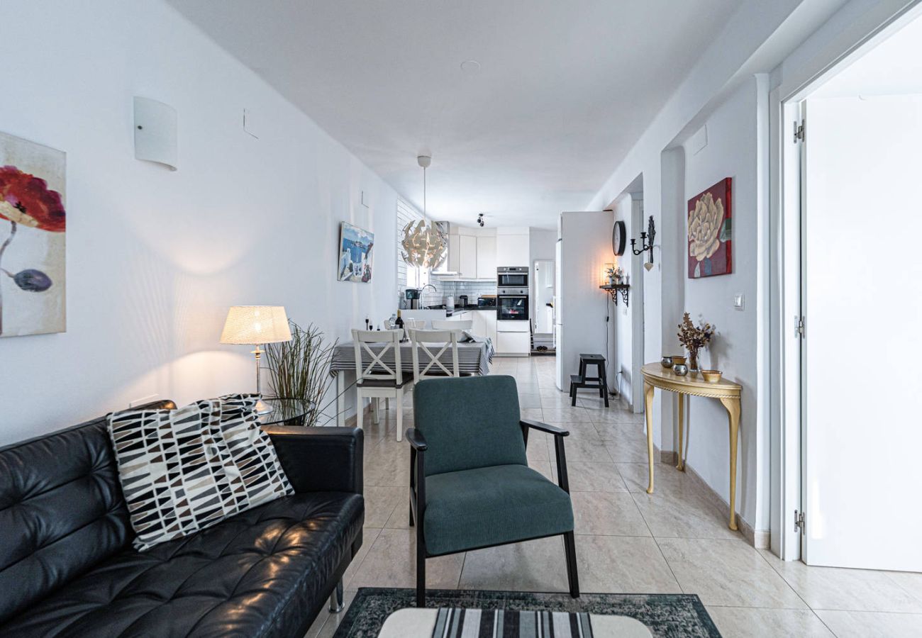 Woonkamer met comfortabele bank